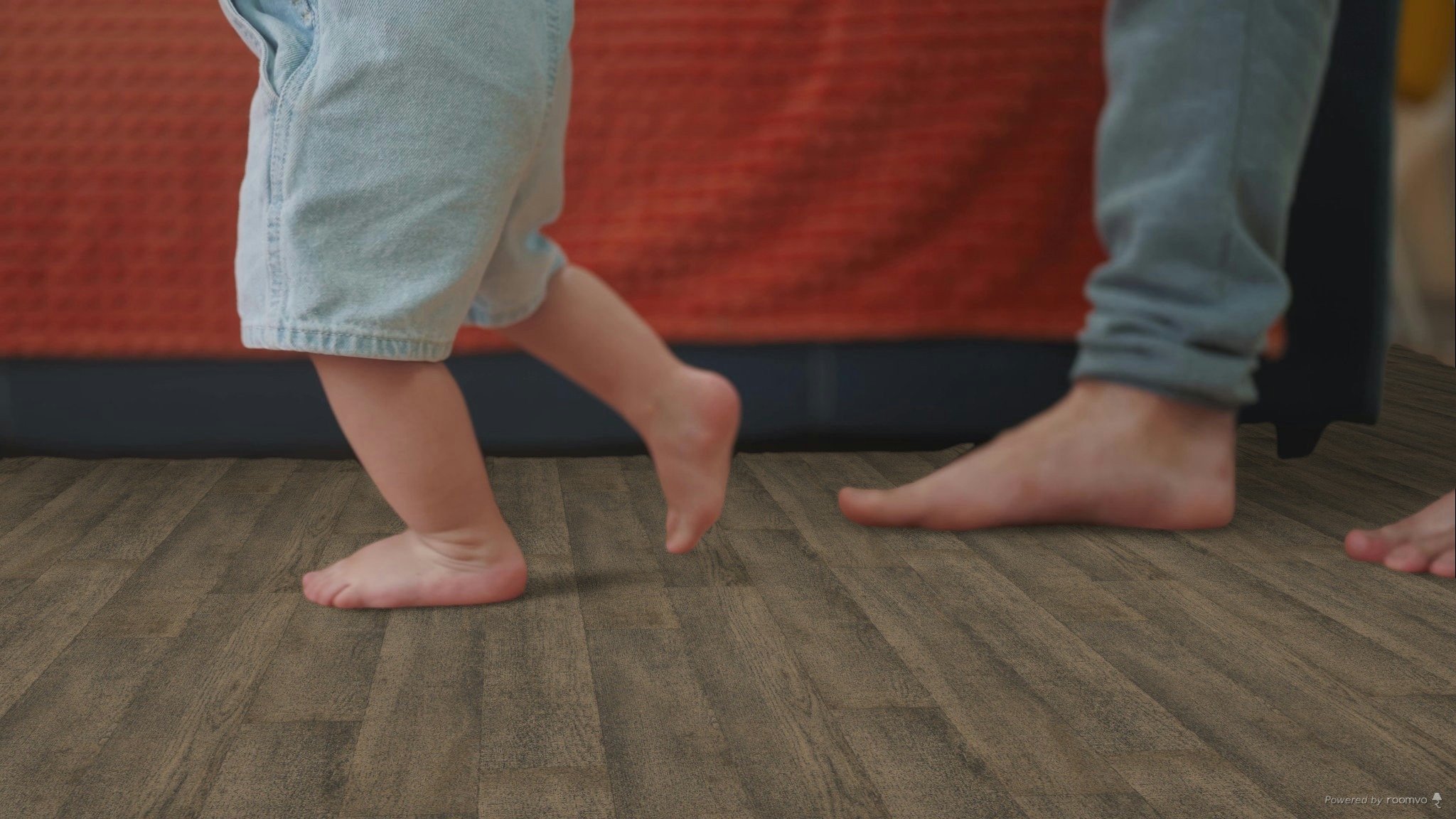 Baby and parent walking